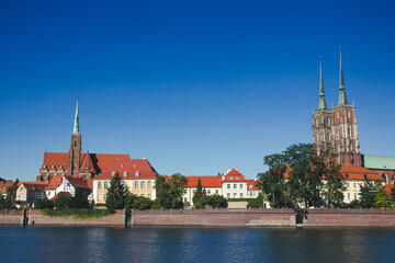 Wroclaw city in Poland. Polish urban cityscape. Odra river flowing through the city scenter. Old...