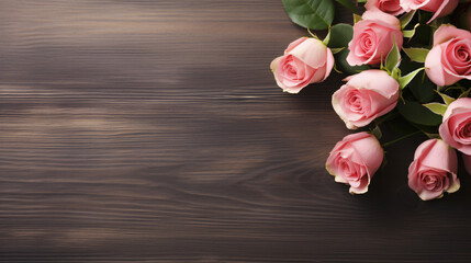Bouquet of roses on wooden background copy space
