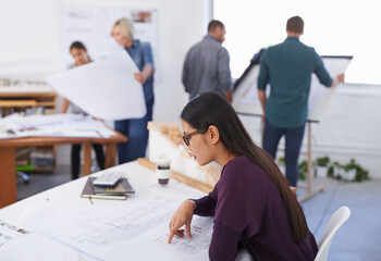 Serious woman, architect or blueprint at desk for planning construction project, building or...