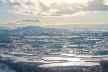 Broken ice in the Ross Sea with mountains, from McMurdo Station, Antartica