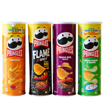 Family pack of potatoes chips Pringles on white background