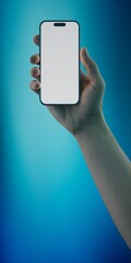 Hand holding a smartphone with a blank screen against a vibrant blue background - 757066895