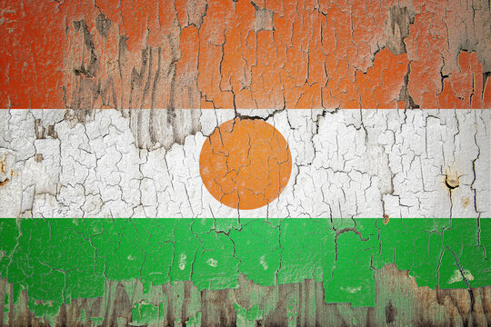 Niger flag painted on the cracked wall