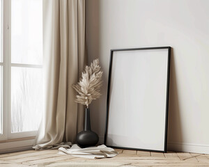 A mockup of an empty black frame leaning against the wall in a modern interior