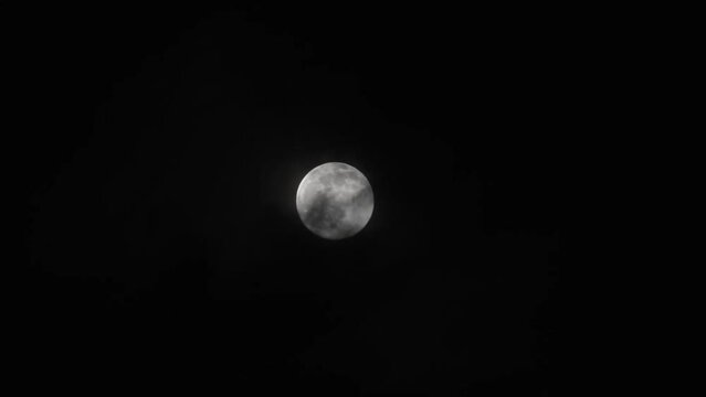 Closeup of a Vibrant full moon on dark sky, taken on October 2023