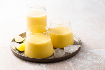 Traditional mango lassi with yogurt