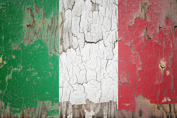 Italy flag painted on the cracked wall