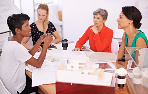 Group of people, architect or business in meeting, teamwork or planning of creative brainstorm. Businesswomen, blueprint or model as corporate, diversity or collaboration in property development
