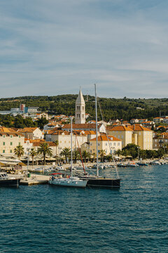 Amazing view of yacht marina and old town Supetar, Brac island, Croatia. Beautiful sunny day.