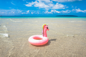Pink rubber ring and beach scenery on the island
