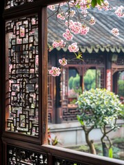 Courtyard Window Adorned with Pink Cherry Blossoms. Spring in Traditional Architecture. Lush Green Plants, Flowers, and Serene Courtyard Scenery Complete the Picture.