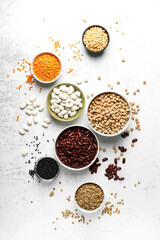 Obraz na płótnie Canvas Various types of legumes, beans, lentils, chickpeas and peas, top view