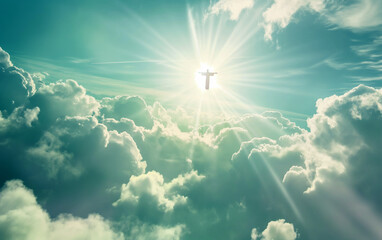 Silhouette of Jesus Christ in front of sun in heaven with sunlights and fluffy clouds. Christ is risen.