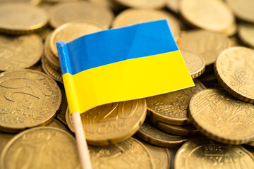 Ukraine flag on coins money, finance and accounting, banking concept.
