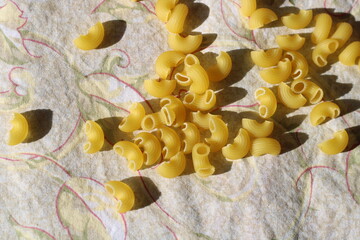 pasta cones are scattered a lot on a napkin, l