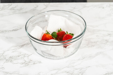 Washed and Dried Strawberries Neatly Stored in a Glass Bowl