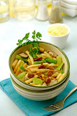 Macaroni with seitan, mushrooms and spring garlic.
