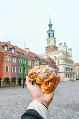 St Martins Croissant in front of the Old Town Hall and Merchants Houses in Poznan Stary Rynek, Poland