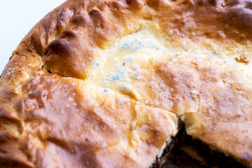 Mold is on the cake. Top view. Spoiled food is dangerous to eat