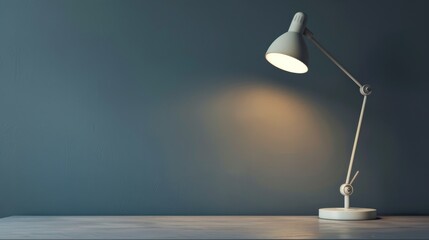 A desk lamp illuminates a wooden table