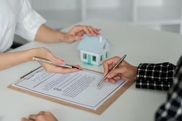real estate agent advise client for putting signature on document contract, real estate purchase,...