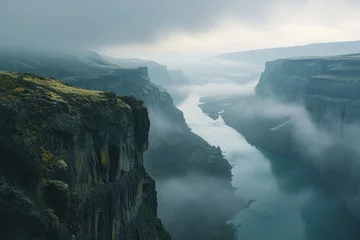 Foto op Canvas A river gracefully winds its way through a misty canyon, creating a serene and captivating scene, A deep river canyon with steep cliffs and foggy mornings, AI Generated © Iftikhar alam