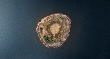 A small island in the middle of the sea