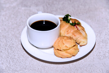 cup of coffee and croissant