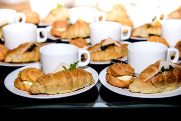 cup of coffee and croissants in a restaurant