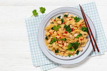 rice noodles with chicken, eggs, chinese broccoli