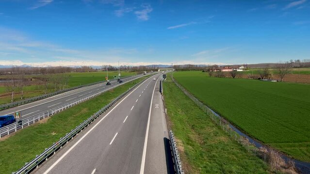 The Italian highway crosses the Po Valley countryside between Turin and Cuneo, A6 highway