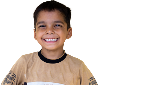 portrait of a smiling little kid showing white teeth transparent background
