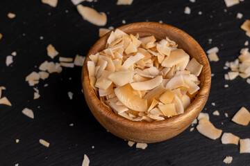 sweet orange and yellow coconut flakes fried in sugar