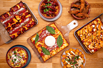 top view Deep fried food , set of the different dishes and Detroit pizza on the wooden  background, 