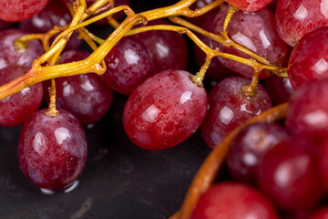 large red wet grapes in drops of water