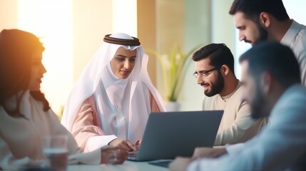 Obraz premium Group of People Sitting Around Laptop Computer