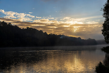 A little fog on the river in autumn