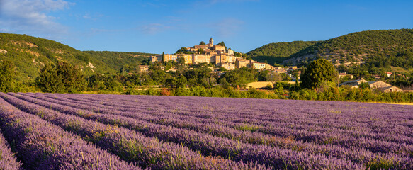 The village of Banon in Provence with lavender fields in summer. Panoramic morning view in Alpes-de-Haute-Provence, French Alps, France - 757208698