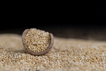 scattered white quinoa seeds, close up