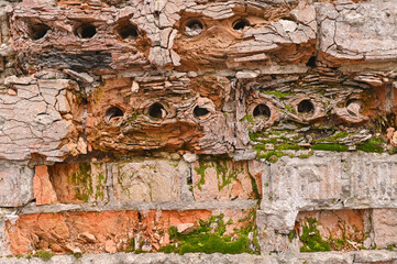 textured background of an old crumbling brick wall