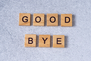 Good bye phrase made of wooden letters. Word.