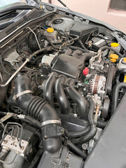 Fototapeta premium Service and repair of a 6-cylinder boxer engine in a car