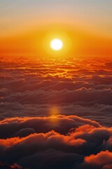 Orange sky with clouds and sunset on the sea horizon.