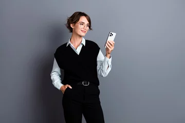 Foto auf Glas Photo of stunning nice lady dressed stylish clothes reading email letter post respost isolated on gray color background © deagreez