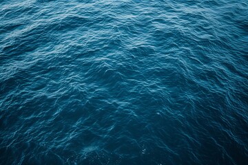 a blue water surface with small ripples