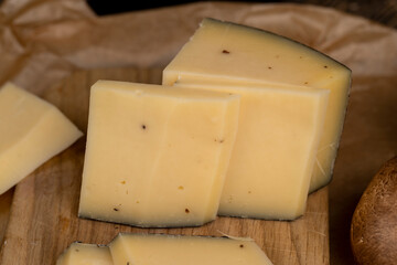 milk cheese with flavor and pieces of mushrooms