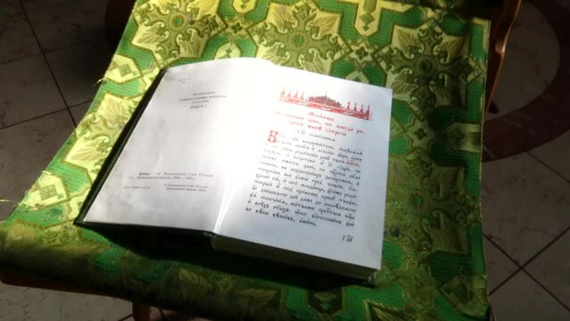 Candles, Bible, holy water in the Orthodox Church. Orthodox Church.