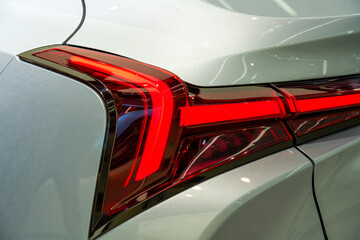 Close-up of headlights and taillights of a luxury car