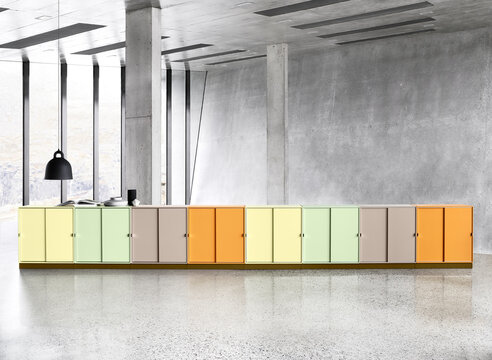 A row of colorful storage lockers in a modern interior setting