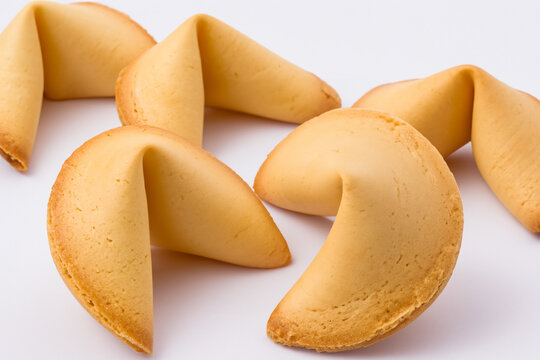 fortune cookies. small light creative fortune cookies lie on a white table, close-up, concept creative